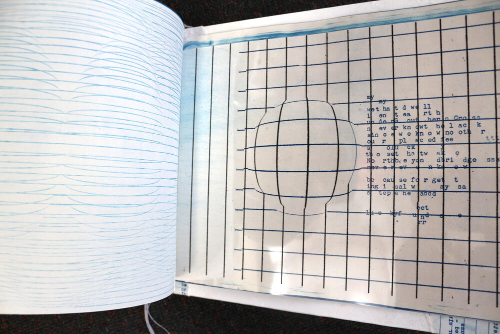 Black &amp; Blue, Artists&#39; Book, page 6, edition of 1, text and imagery via cyanotype printing on paper, pages have additional acetate overlays with inkjet graphics, 48 x 30cm, 2010.